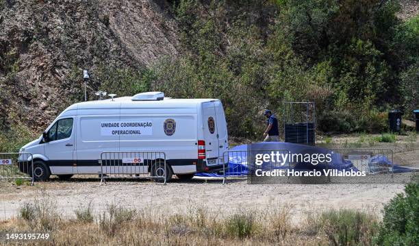 Portuguese police investigators dismantle base camp at the end of the three-day search for remains of Madeleine McCann at Barragem do Arade Reservoir...