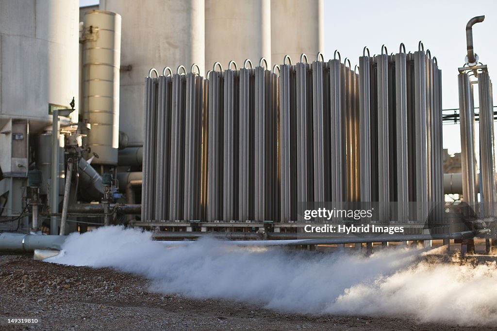 Machinery and smoke at oil refinery