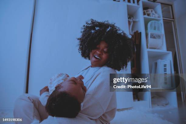 Mother Rocking Mom Rocking Baby At Night Photos and Premium High Res Pictures - Getty ...