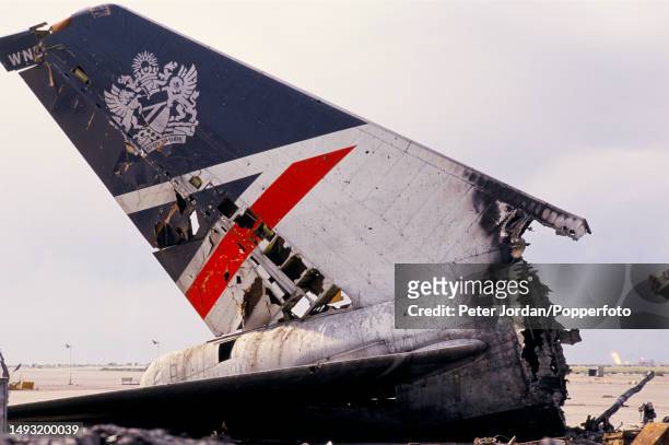 Wreckage of the tailplane of a British Airways Boeing 747 aircraft, registration G-AWND, on an apron at Kuwait International Airport in Kuwait in...