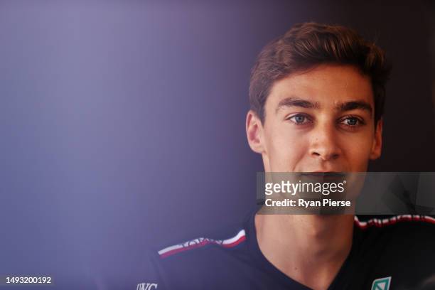 George Russell of Great Britain and Mercedes looks on in the Paddock during previews ahead of the F1 Grand Prix of Monaco at Circuit de Monaco on May...