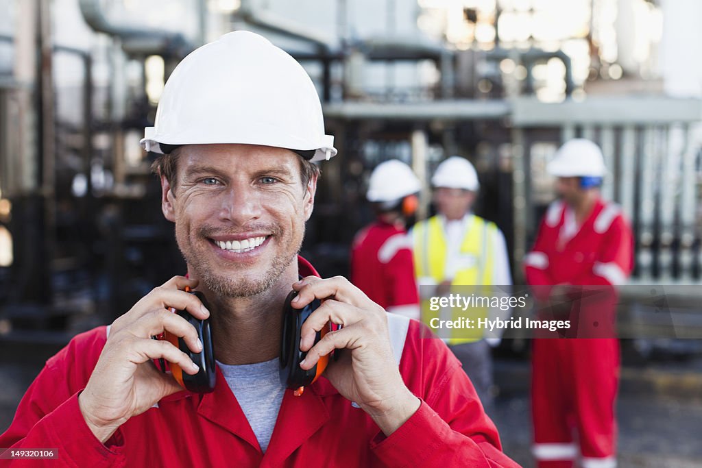 Worker standing at chemical plant