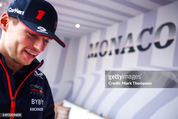 Max Verstappen of the Netherlands and Oracle Red Bull Racing looks on in the Paddock during previews ahead of the F1 Grand Prix of Monaco at Circuit...
