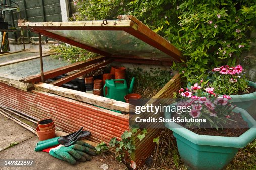 Solution Time Frame Garden With Potted Flowers And Cold Frame High-Res Stock Photo - Getty ...