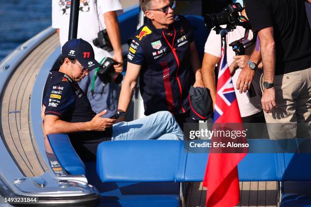 Sergio Perez of Mexico and Oracle Red Bull Racing leaves the marina in the boat during previews ahead of the F1 Grand Prix of Monaco at Circuit de...