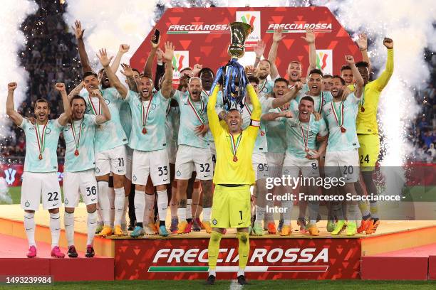 Samir Handanovic of FC Internazionale lifts the trophy after winning the Coppa Italia Final match between ACF Fiorentina and FC Internazionale at...