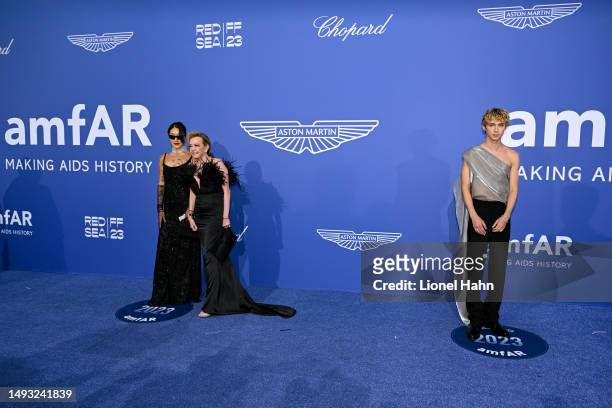 Peggy Gou, Chopard Co-President Caroline Scheufele and Troye Sivan attend the amfAR Cannes Gala 2023 Sponsored by Aston Martin at Hotel du...
