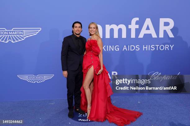 Benjamin Larretche and Petra Nemcova attend the amfAR Cannes Gala 2023 at Hotel du Cap-Eden-Roc on May 25, 2023 in Cap d'Antibes, France.