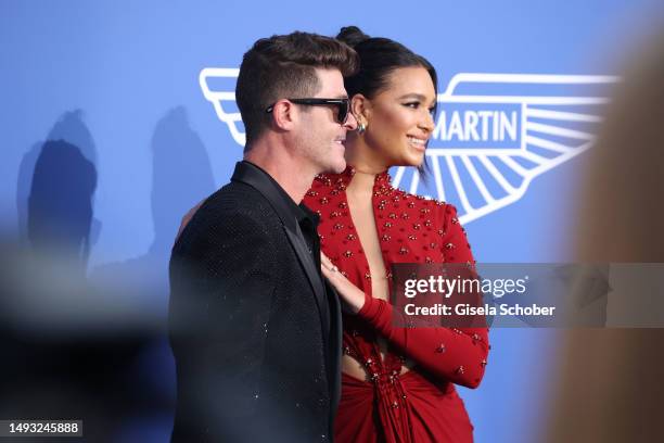 Robin Thicke and April Love Geary attend the amfAR Cannes Gala 2023 at Hotel du Cap-Eden-Roc on May 25, 2023 in Cap d'Antibes, France.