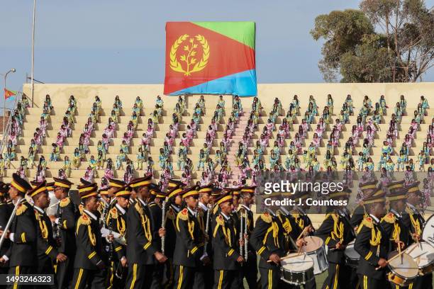 Members of Eritreas armed forces marching band march past a reviewing stand where President Isaias Afewerki and numerous dignitaries and government...