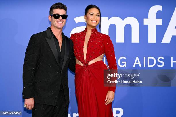 Robin Thicke and April Love Geary attend the amfAR Cannes Gala 2023 Sponsored by Aston Martin at Hotel du Cap-Eden-Roc on May 25, 2023 in Cap...