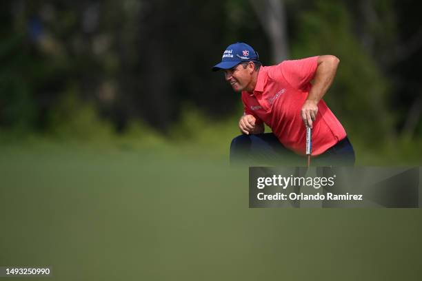 Padraig Harrington of Ireland lines up a putt on the eighth green during the first round of the KitchenAid Senior PGA Championship at Fields Ranch...