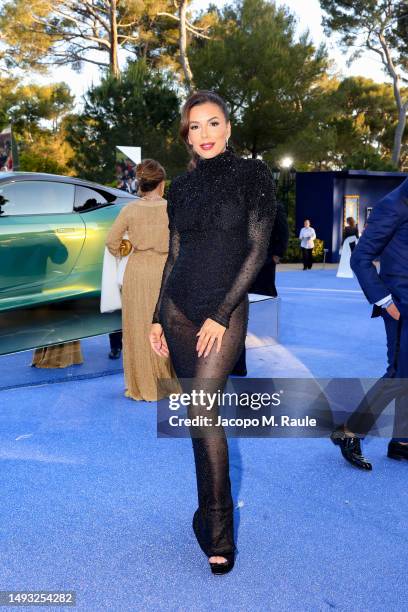Eva Longoria is pictured with the new Aston Martin DB12 during the amfAR Cannes Gala 2023 at Hotel du Cap-Eden-Roc on May 25, 2023 in Cap d'Antibes,...