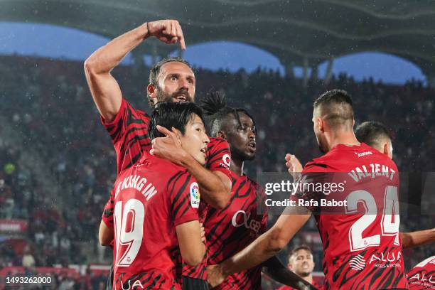 Vedat Muriqi of RCD Mallorca celebrates scoring his team´s first goal with teammates during the LaLiga Santander match between RCD Mallorca and...
