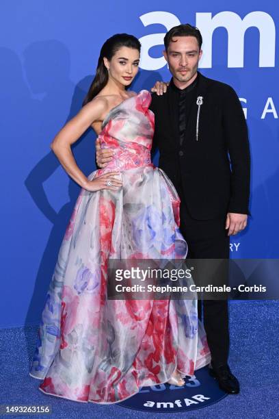 Amy Jackson and Ed Westwick attend the amfAR Cannes Gala 2023 at Hotel du Cap-Eden-Roc on May 25, 2023 in Cap d'Antibes, France.
