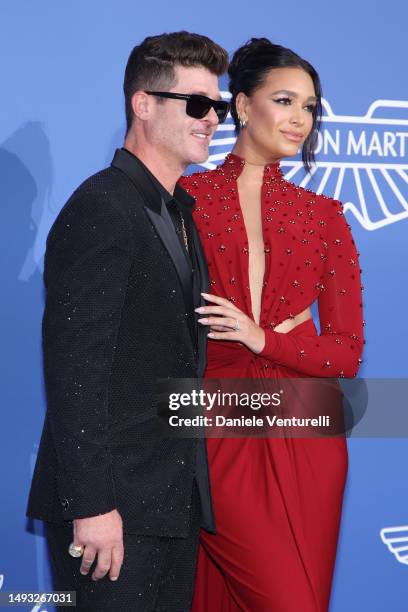 Robin Thicke and April Love Geary attend the amfAR Cannes Gala 2023 at Hotel du Cap-Eden-Roc on May 25, 2023 in Cap d'Antibes, France.