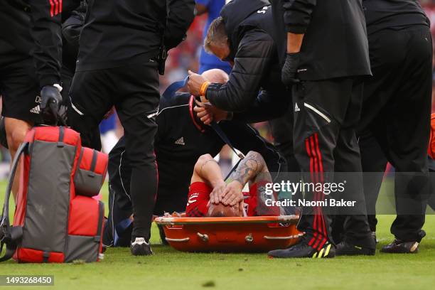 Antony of Manchester United leaves the pitch on a stretcher after picking up an injury during the Premier League match between Manchester United and...