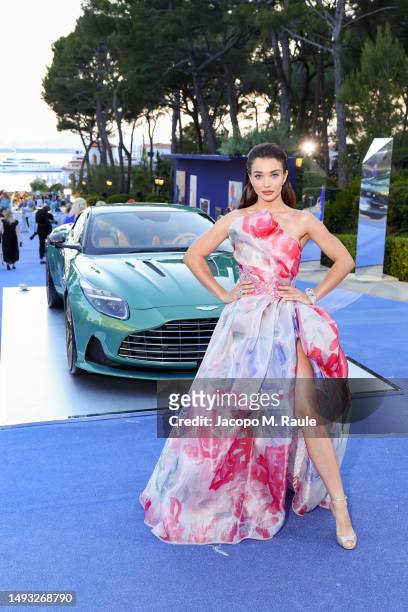 Amy Jackson is pictured with the new Aston Martin DB12 during the amfAR Cannes Gala 2023 at Hotel du Cap-Eden-Roc on May 25, 2023 in Cap d'Antibes,...