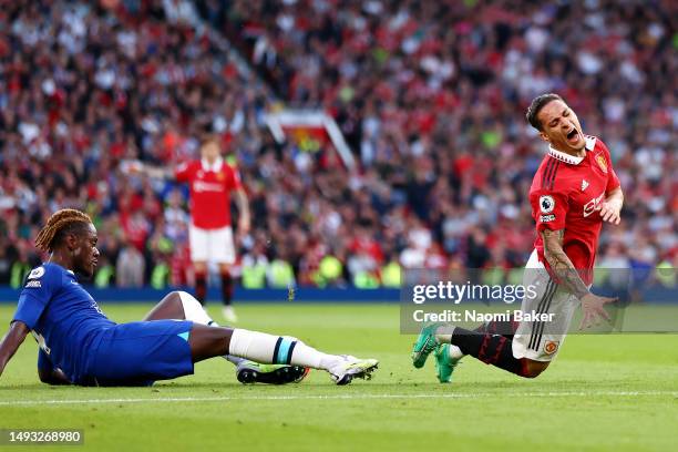 Antony of Manchester United is tackled by Trevoh Chalobah of Chelsea which results in them picking up an injury before being stretched off during the...