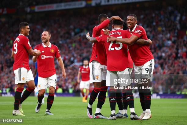Anthony Martial of Manchester United celebrates with Marcus Rashford and Jadon Sancho after scoring the team's second goal during the Premier League...