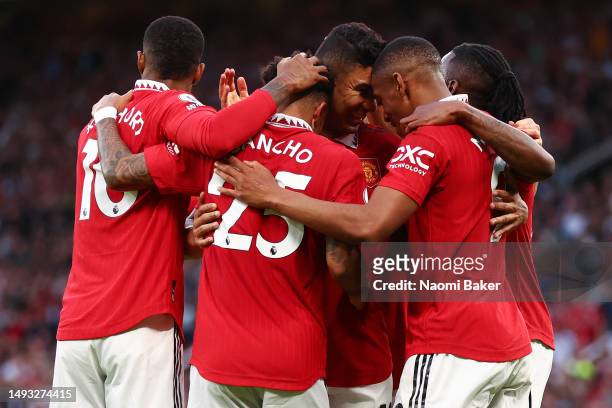 Anthony Martial of Manchester United celebrates after scoring the team's second goal with team mates during the Premier League match between...