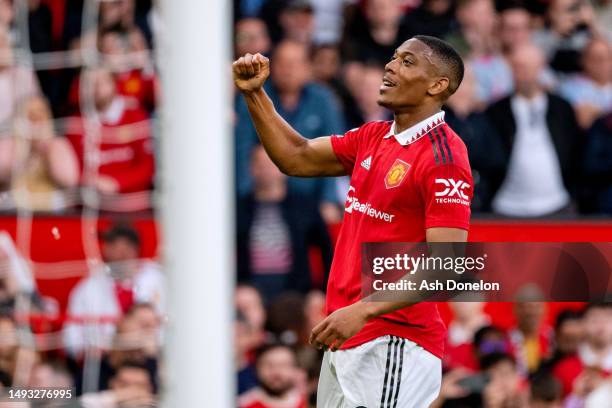 Anthony Martial of Manchester United celebrates after scoring their sides second goal during the Premier League match between Manchester United and...