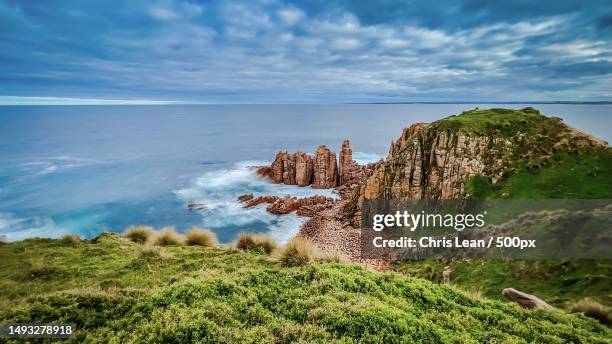 scenic view of sea against sky,cape woolamai,victoria,australia - phillip island stockfoto's en -beelden