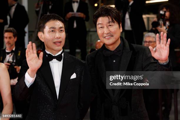 Oh Jung-se and Song Kang-ho attend the "Cobweb " red carpet during the 76th annual Cannes film festival at Palais des Festivals on May 25, 2023 in...