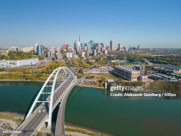 aerial view of bridge over river against clear sky,edmonton,canada - edmonton stock-fotos und bilder