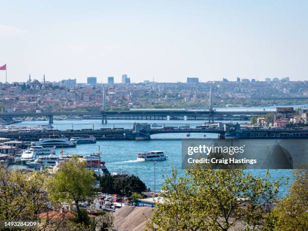 istanbul, turkey - container ship crossing through the yavuz sultan selim bridge high angle footage - bosporus shipping trade fotografías e imágenes de stock