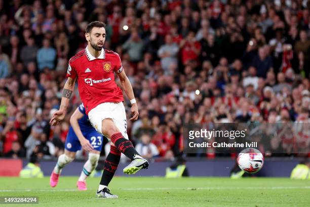 Bruno Fernandes of Manchester United scores the team's third goal from a penalty kick during the Premier League match between Manchester United and...