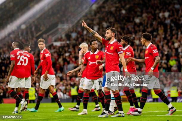 Bruno Fernandes of Manchester United celebrates after scoring their sides third goal from the penalty spot during the Premier League match between...