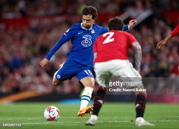 Joao Felix of Chelsea scores the team's first goal during the Premier League match between Manchester United and Chelsea FC at Old Trafford on May...