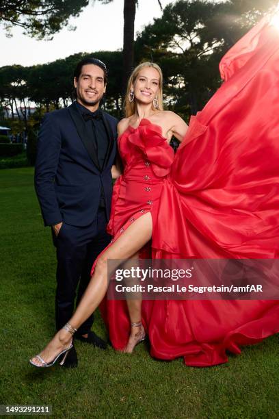 Benjamin Larretche and Petra Nemcova attend the amfAR Cannes Gala 2023 at Hotel du Cap-Eden-Roc on May 25, 2023 in Cap d'Antibes, France.