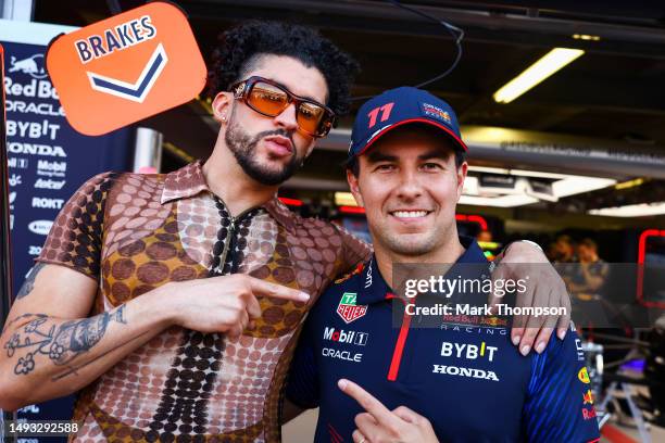 Sergio Perez of Mexico and Oracle Red Bull Racing poses for a photo with Bad Bunny during previews ahead of the F1 Grand Prix of Monaco at Circuit de...