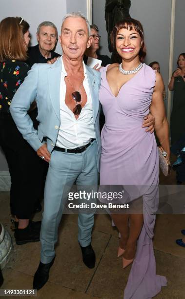 Bruno Tonioli and Danielle de Niese wearing a Vivienne Westwood dress and jewellery by Van Cleef attend the "Aspects of Love" opening night post-show...