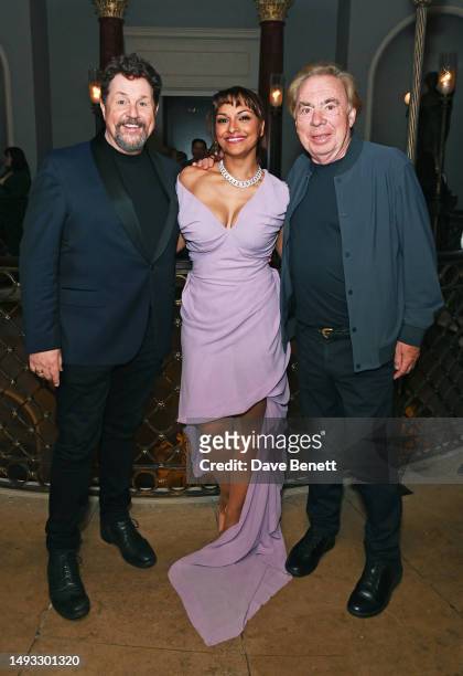 Michael Ball, Danielle de Niese wearing a Vivienne Westwood dress and jewellery by Van Cleef and Lord Andrew Lloyd Webber attend the "Aspects of...