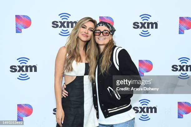 Chrishell Stause and G Flip attend the SiriusXM Studios Interview with Chrishell Stause and G Flip at SiriusXM Studios on May 25, 2023 in Los...