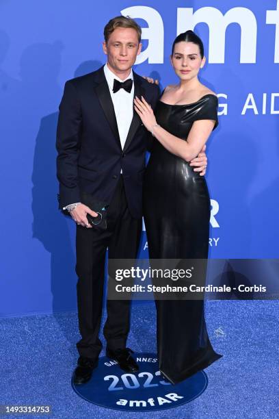 Matthias Schweighöfer and Ruby O. Fee attend the amfAR Cannes Gala 2023 at Hotel du Cap-Eden-Roc on May 25, 2023 in Cap d'Antibes, France.