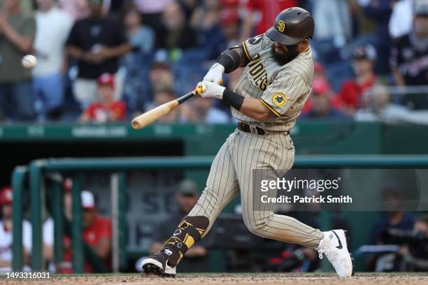 Rougned Odor of the San Diego Padres hits a three run home run against the Washington Nationals during the ninth inning at Nationals Park on May 25,...