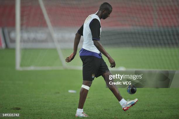 Yaya Toure of Manchester City takes part in a training session before a pre-season friendly match against Arsenal on July 26, 2012 in Beijing, China.