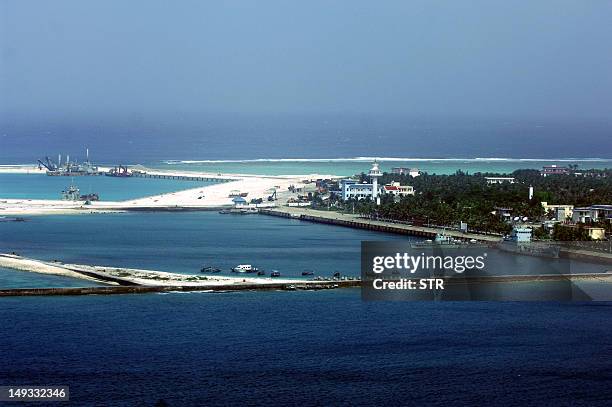 This aerial view of the city of Sansha on an island in the disputed Paracel chain, which China now considers part of Hainan province on July 27,...