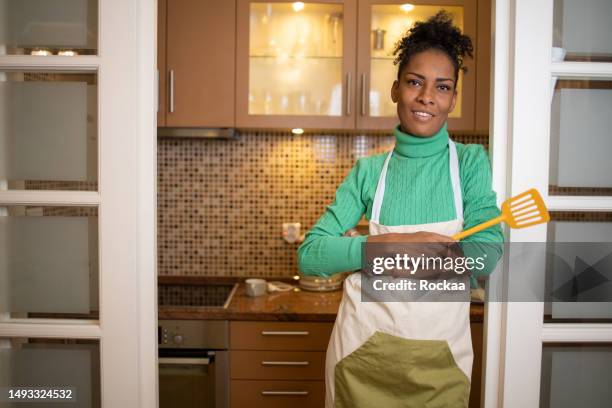 kitchen - black apron stock pictures, royalty-free photos & images