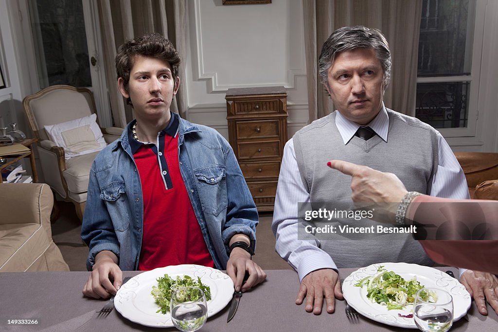 Father and son being told off by their mother/wife