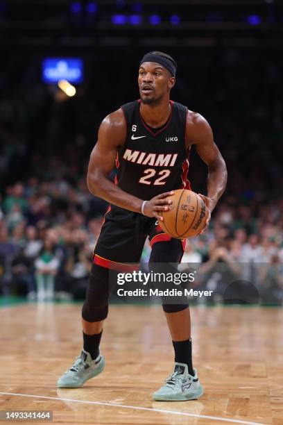 Jimmy Butler of the Miami Heat controls the ball against the Boston Celtics during the first quarter in game five of the Eastern Conference Finals at...