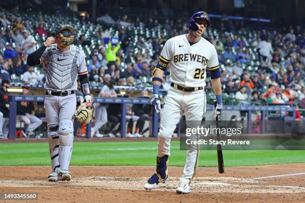 Christian Yelich of the Milwaukee Brewers reacts to a strike out during the seventh inning against the San Francisco Giants at American Family Field...