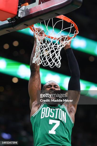 Jaylen Brown of the Boston Celtics dunks the ball against the Miami Heat during the third quarter in game five of the Eastern Conference Finals at TD...