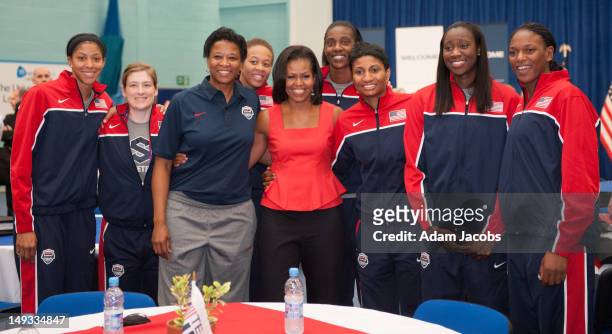 First Lady Michelle Obama meets Candace Parker, Lindsay Whalen, Assistant Coach Jennifer Gillom, Seimone Augustus, Sylvia Fowles, Angel McCoughtry,...