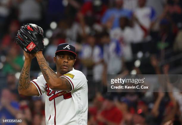 Raisel Iglesias of the Atlanta Braves reacts after their 8-5 win over the Philadelphia Phillies at Truist Park on May 25, 2023 in Atlanta, Georgia.