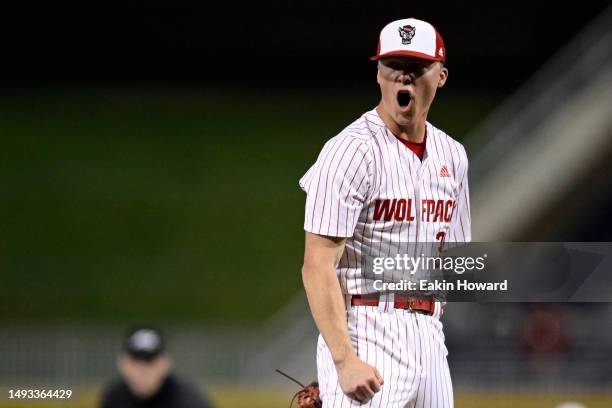 Justin Lawson of the NC State Wolfpack celebrates a strike out against the Miami Hurricanes in the seventh inning during the ACC Baseball...